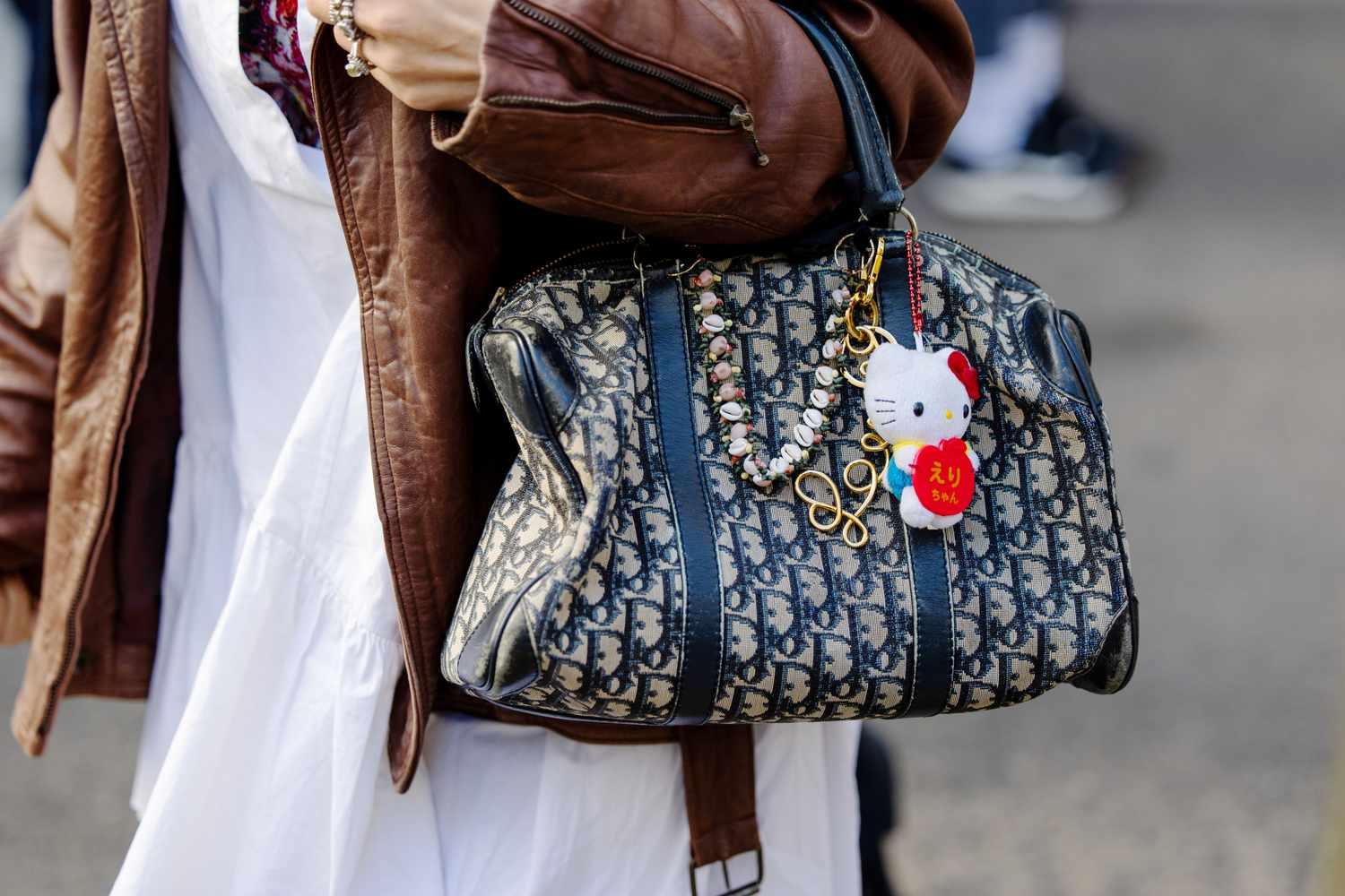 hand-bag-trends-charms-GettyImages-2194584054-f52df693659e4dd29d9cfe4c31e614f1